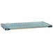 A MetroMax dunnage shelf with a blue polymer mat on it.