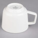 A Villeroy & Boch white porcelain coffee mug with a handle.