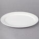 A white Villeroy & Boch porcelain oval platter with a rim.