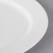 A close-up of a Villeroy & Boch white porcelain oval plate.