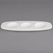 A white Villeroy & Boch oval plate with 3 compartments.