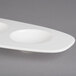 A white Villeroy & Boch oval plate with two compartments.