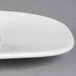 A close-up of a white Villeroy & Boch porcelain oval platter.