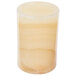 A cylindrical glass candle holder with a cream colored top.
