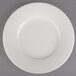 A Villeroy & Boch white porcelain plate with a small rim on a white background.
