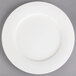 A white Villeroy & Boch porcelain plate with a white circle on the rim.