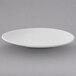A white Villeroy & Boch porcelain oval plate on a gray background.
