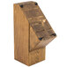 A wooden knife holder with holes for Dexter-Russell 7-Piece Knife Set.