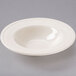 An Ivory (American White) china bowl with a decorative white rim.