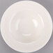 An Ivory (American White) china bowl with an embossed rim and a circular pattern.