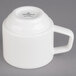 A Villeroy & Boch white porcelain stackable cup with a handle.