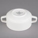 A white Villeroy & Boch porcelain soup bowl with handles.