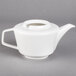 A Villeroy & Boch white porcelain coffeepot with a handle.