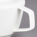 A Villeroy & Boch white porcelain coffeepot with a cover.