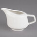 A white Villeroy & Boch creamer with a handle.