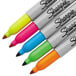 A pack of Sharpie neon markers with different colors.