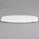 A white porcelain Villeroy & Boch oval plate with a long edge.