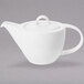 A Villeroy & Boch white porcelain teapot with a lid.