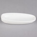 A white oval shaped porcelain sugar bowl cover.