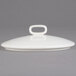 A white Villeroy & Boch porcelain lid with a knob.