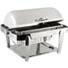 A Bon Chef stainless steel roll top chafer with a vented lid on a tray.