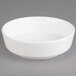 A Villeroy & Boch white porcelain bowl on a gray background.