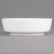 A Villeroy & Boch white porcelain bowl on a gray background.