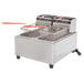 A Cecilware stainless steel electric countertop deep fryer with two fry tanks.