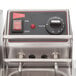 A Cecilware stainless steel electric countertop deep fryer on a grey surface.