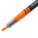 The chisel tip of a Sharpie highlighter with orange ink.