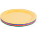A stack of GET Diamond Mardi Gras oval melamine platters in assorted colors.