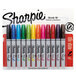 A package of Sharpie brush tip permanent markers in assorted colors.