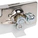A Swing-A-Way Wall Mount Can Opener with metal parts including a latch and bolt.