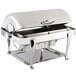 A Bon Chef stainless steel roll top chafer with Roman legs and a lid on a tray.
