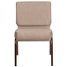 A beige Flash Furniture church chair with copper vein metal legs.