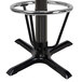 A black cast iron bar height table base with a foot ring.