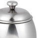 A mirror-finished stainless steel Vollrath sugar bowl with a lid.
