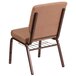 A Flash Furniture Hercules Series Caramel church chair with a copper vein metal frame and book rack.