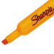 A close-up of a Sharpie orange highlighter with the cap off.