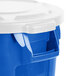 A blue and white Rubbermaid BRUTE recycling can with a white lid.