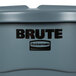 A gray Rubbermaid Brute 55 gallon trash can with lid.