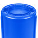 A blue Rubbermaid BRUTE plastic barrel with a lid.