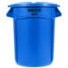 A blue Rubbermaid BRUTE round plastic trash can with lid.