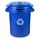 A blue Rubbermaid BRUTE recycling can with a white recycle symbol on the lid.