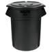 A black Rubbermaid Brute trash can with a lid.