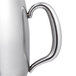 A Vollrath stainless steel coffee/tea pot with a handle.