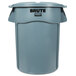 A gray Rubbermaid BRUTE trash can with lid.