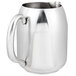 A Vollrath stainless steel pitcher with a handle.