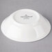 A white Villeroy & Boch porcelain bowl with black text.