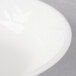 A close up of a Villeroy & Boch white porcelain bowl with a white rim.